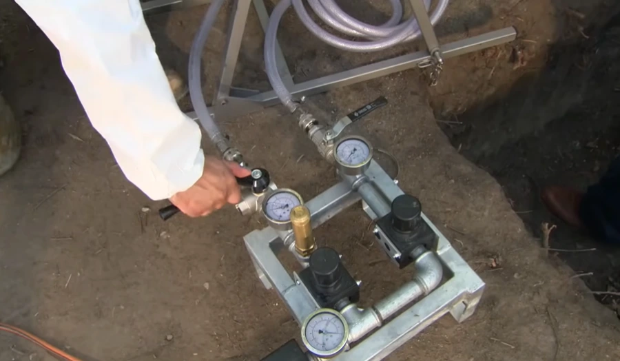 Setting up a machine to check a pipe under a road – burst pipe repair in Ontario