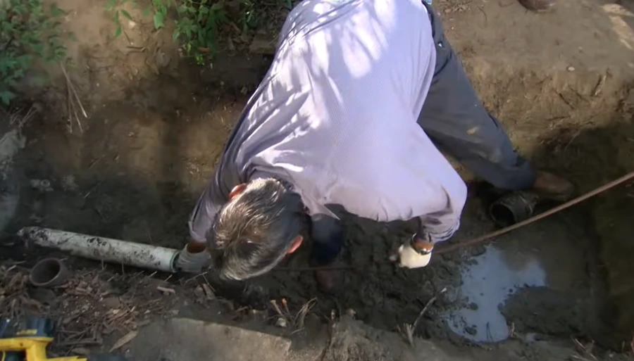 Sending a camera through a pipe to check it – contact Pomona Water Damage Pro
